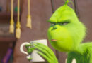 Grinch zangado a segurar uma caneca no filme Grinch