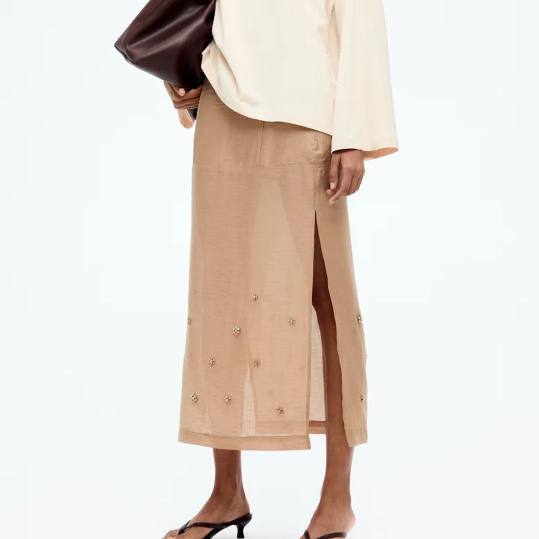 Saia castanha da h&m.