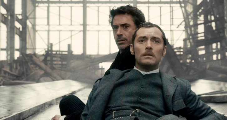 Robert Downey Jr. e Jude Law (Sherlock Holmes) 