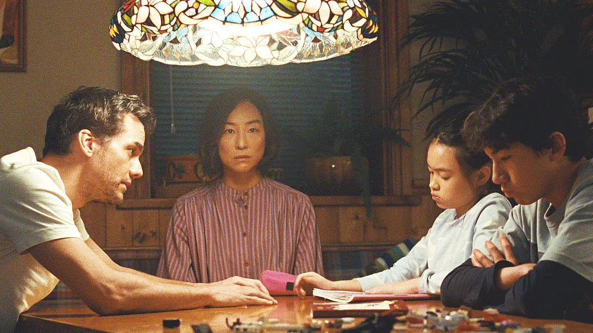 The Last House. (L-R) Wagner Moura as Jason, Greta Lee as Ann, Riley Chung as Ruth and Noah Alexander Sosnowski as Graham in The Last House. Cr. Courtesy Netflix © 2026